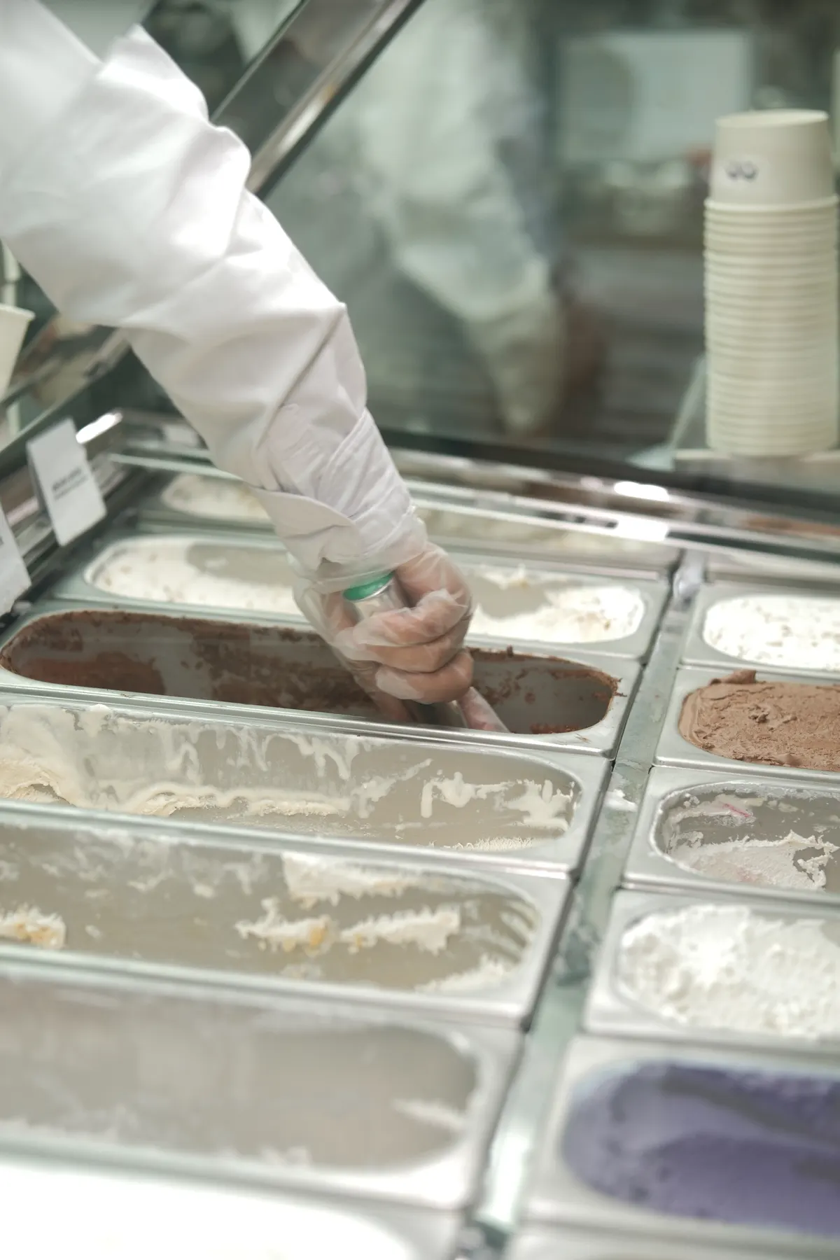 Kurimu scoops being served from the ice cream display at an event